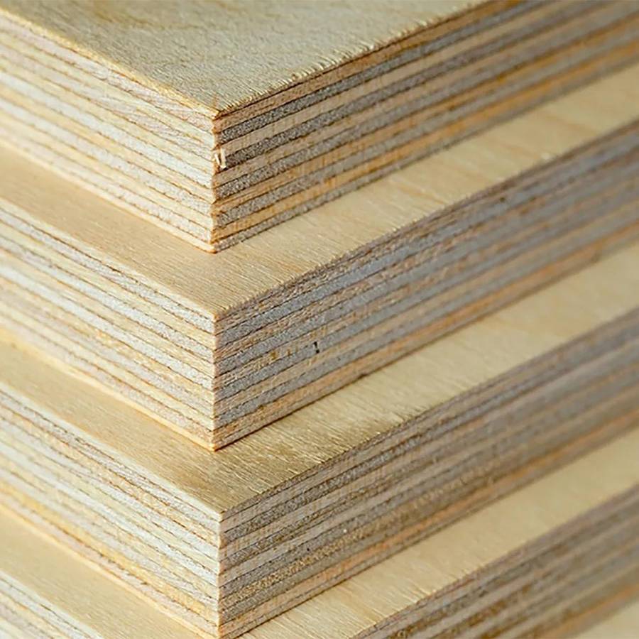 Close-up of stacked birch plywood edges showing the cross-laminated layers