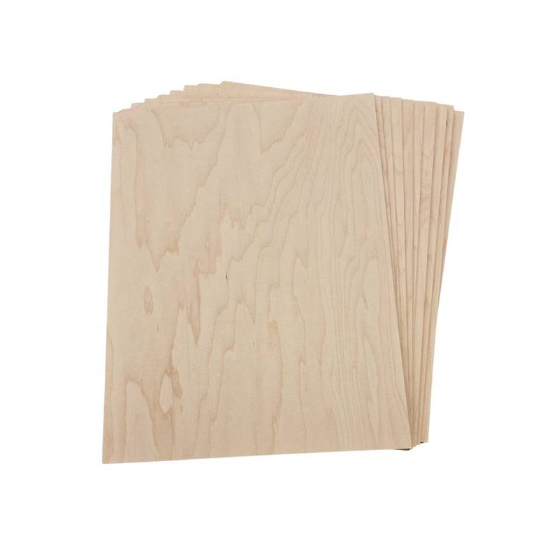 A stack of thin pale birch plywood sheets for laser cutting